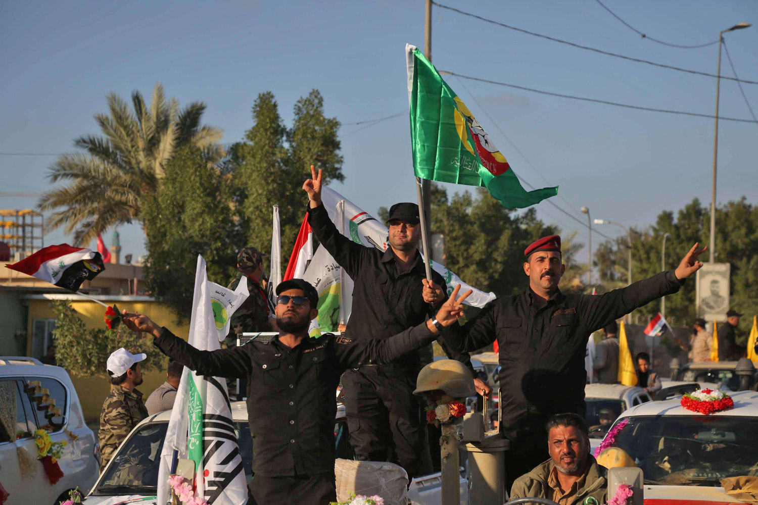 عصابات الحشد الشعبي تطالب بإخلاء القواعد الأميركية في العراق