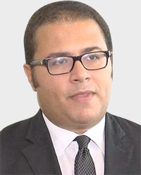 محمد أبوباشا: يجب تسريع إقرار قانون الدين لتخفيف نقص السيولة