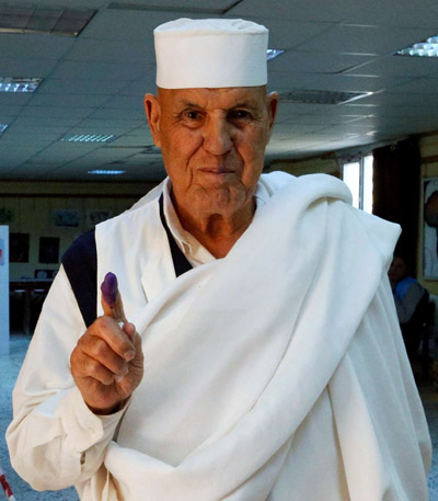 أزمة ليبيا لن تحل لمجرد رؤية المواطنين يتوافدون على صناديق الاقتراع، إذ لا أحد يملك الضمانات الكافية لعدم تأثير الميليشيات  على نتيجة هذه الانتخابات