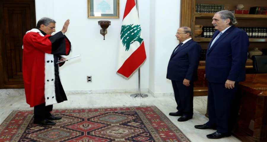 [ الرئيس عون ومعه جريصاتي يعارضان اتفاق الطائف الذي أقره نواب الأمة، بحجة “سلخ” الصلاحيات التي كان يتمتع بها رئيس الجمهورية “الماروني” وحصرها في مجلس الوزراء مجتمعاً الذي يرأسه "مسلم سني"