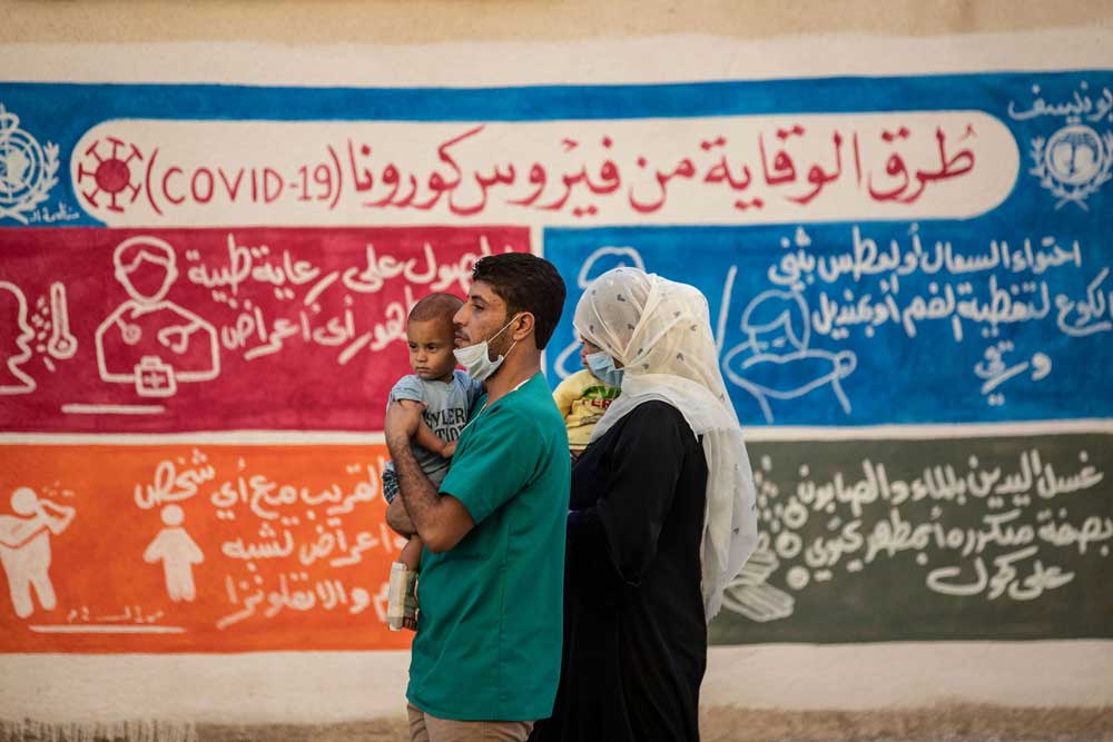 الفايروس يفاقم معاناة السوريين